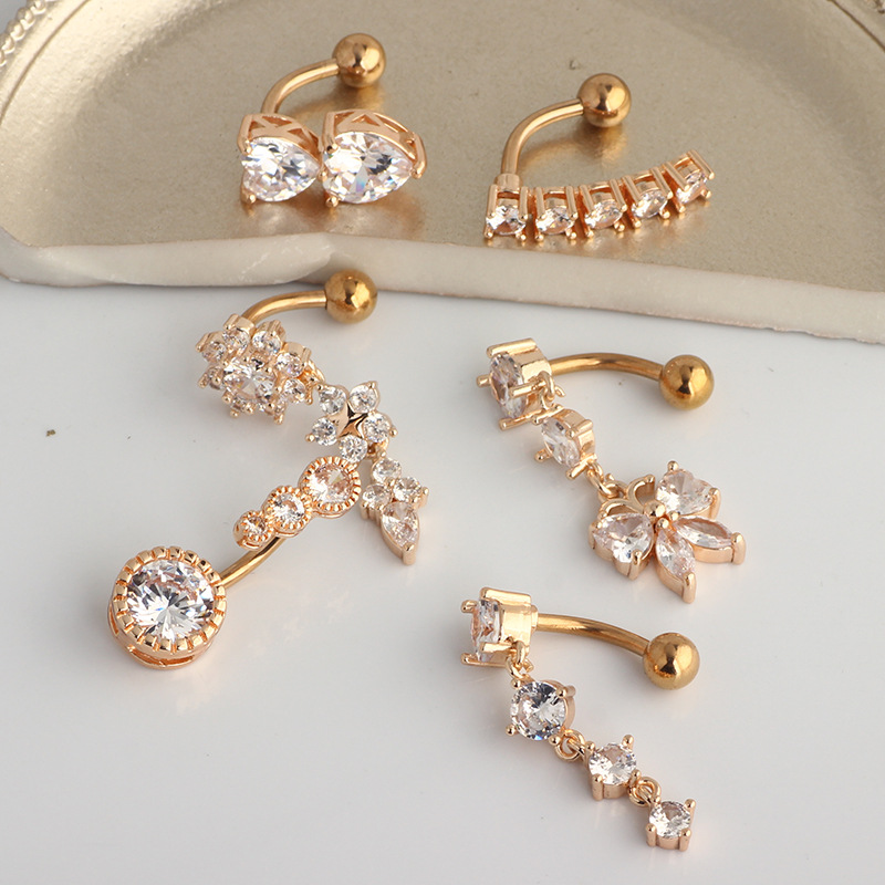 حلقة سرة البطن المتدلية من الف - مراجعة Body Jewelry Surgical Steel وسعره