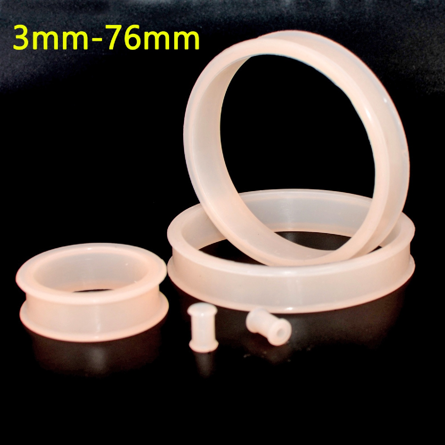 2pcs Supersize مرنة السيليكون  - مراجعة Body Jewelry Ear Gauges وسعره